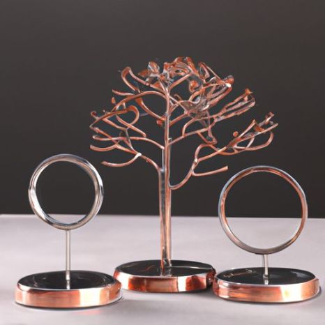 Acabado de revestimiento de cobre, anillo de embalaje de viaje con forma de tres pájaros y diseño grabado para organizador, soporte de presentación de joyería de metal moderno con